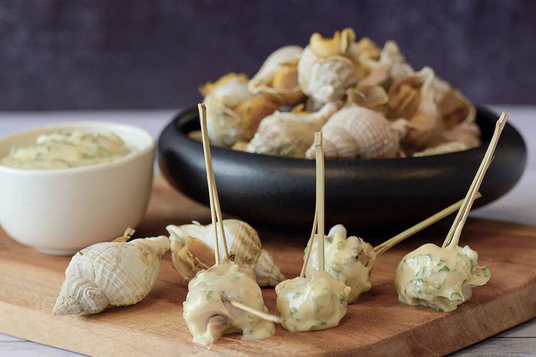 Bulots, sauce crémeuse aux fines herbes